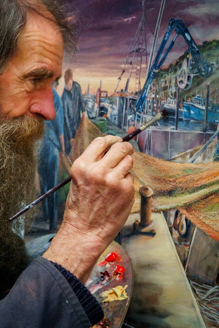 Artist painting at Porthleven